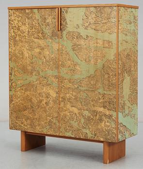 A G.A. Berg cabinet with printed map depicting the city of Stockholm, Sweden 1940's.