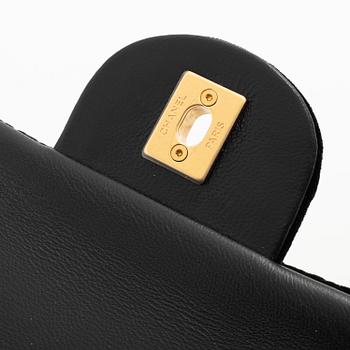 Chanel, A Black velvet Bag.