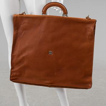 A brown leather and suede Garment cover by Björn Borg designgroup, 1980's.