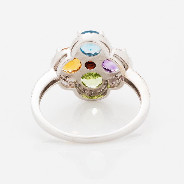 Ring, med fasettslipad topas, ametist, peridot, citrin och briljantslipade diamanter i form av blomma.