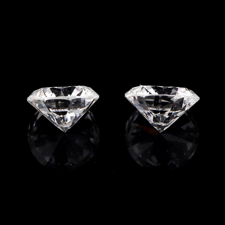 Two brilliant-cut diamonds.