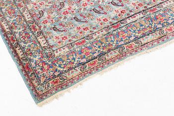 A Persian rug, c. 220 x 140 cm.