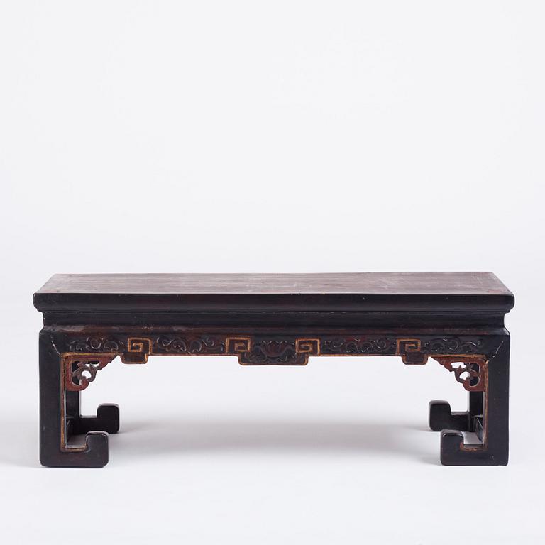 A Chinese lacquered Kang table, Qing dynasty.