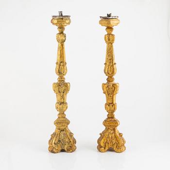 A pair of altar candle sticks, possibly southern Europe, 19th century.