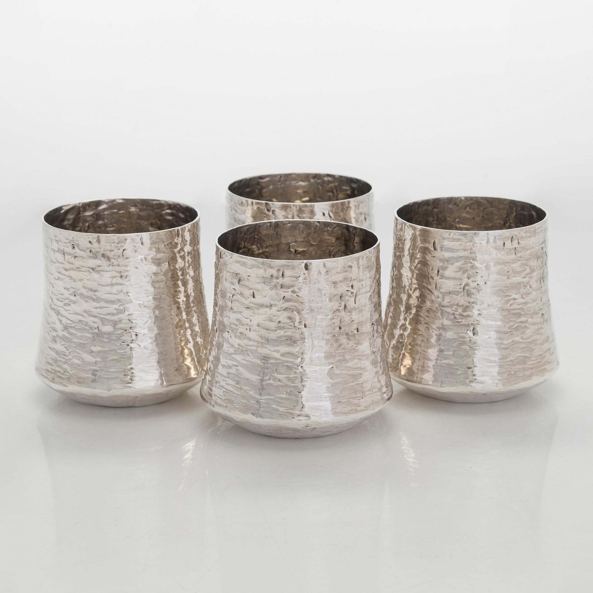 Tapio Wirkkala, four silver beakers, and a rosewood and sterling silver tray, Kultakeskus, Hämeenlinna 1973-74.