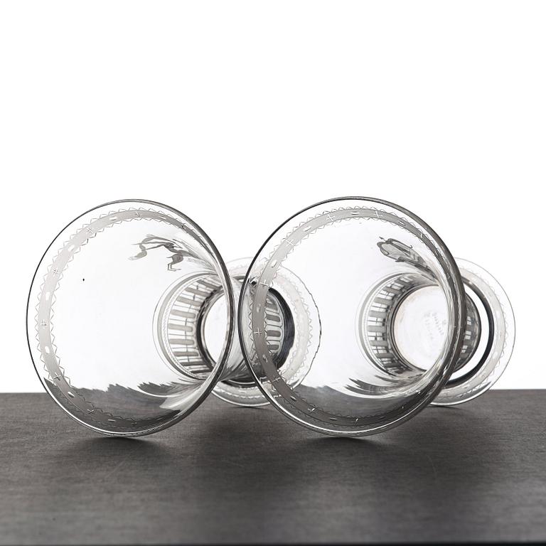 Simon Gate, two Swedish Grace engraved glass beakers, Orrefors, Sweden 1924.