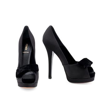 FENDI, a pair of black satin pumps.