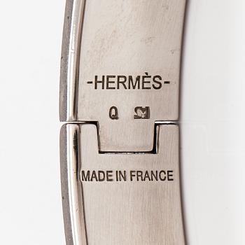Hermès, armband, "Clic H PM", silverfärgad metall och svart emalj.