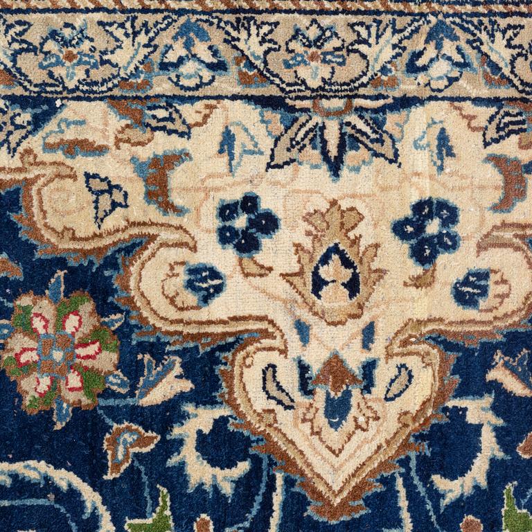 A carpet, possibly Yasd, c. 459 x 309 cm.