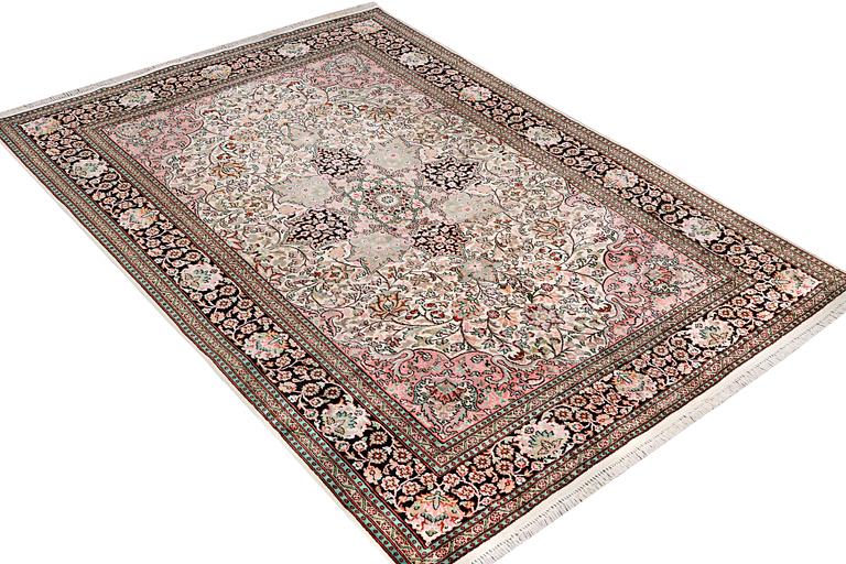A silk Kashmir carpet, c. 267 x 185 cm.