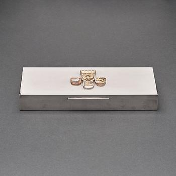 Wiwen Nilsson, a sterling rectangular box with a two colour gilt emblema in relief, Lund 1956.