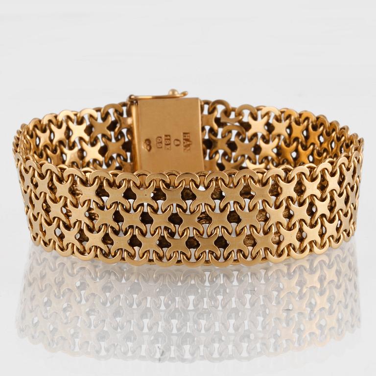 ARMLÄNK, 18K guld, Norens Guldatelje, Stockholm, 1964. Vikt 36,3 gram.