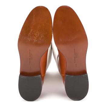 RALPH LAUREN, a pair of white canvas and leather boots. Size US 8.
