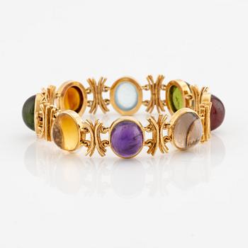 W.A. Bolin, design Barbro Littmarck, armband, 18K guld med cabochonslipade färgstenar, Stockholm 1970.