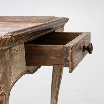 A Rococo table, 18th century.