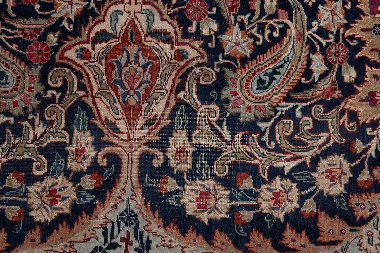 A Kashmar carpet, c. 390 x 289 cm.