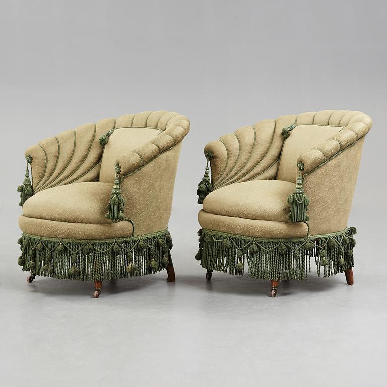 A pair of easy chairs, circa 1900.