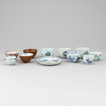 Eleven porcelain cups with one dish, Mostly Qing dynasty, 18th century.