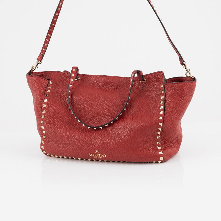 Valentino Gravani, a red leather studded tote bag, 2018.