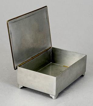 SKRIN, tenn och mässing. Firma Svenskt Tenn, Stockholm 1928.