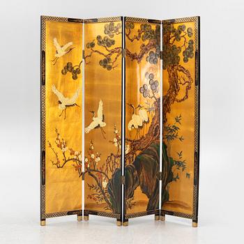 A Chinese lacquer folding screen, 20th century.