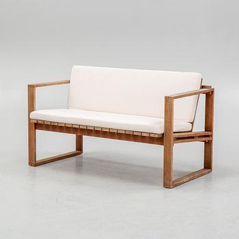 A garden table with sofa and three armchiars, Carl Hansen & Søn, Denmark.