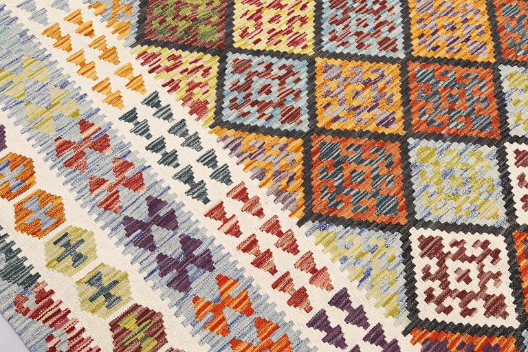 A Kelim carpet, c. 495 x 317 cm.