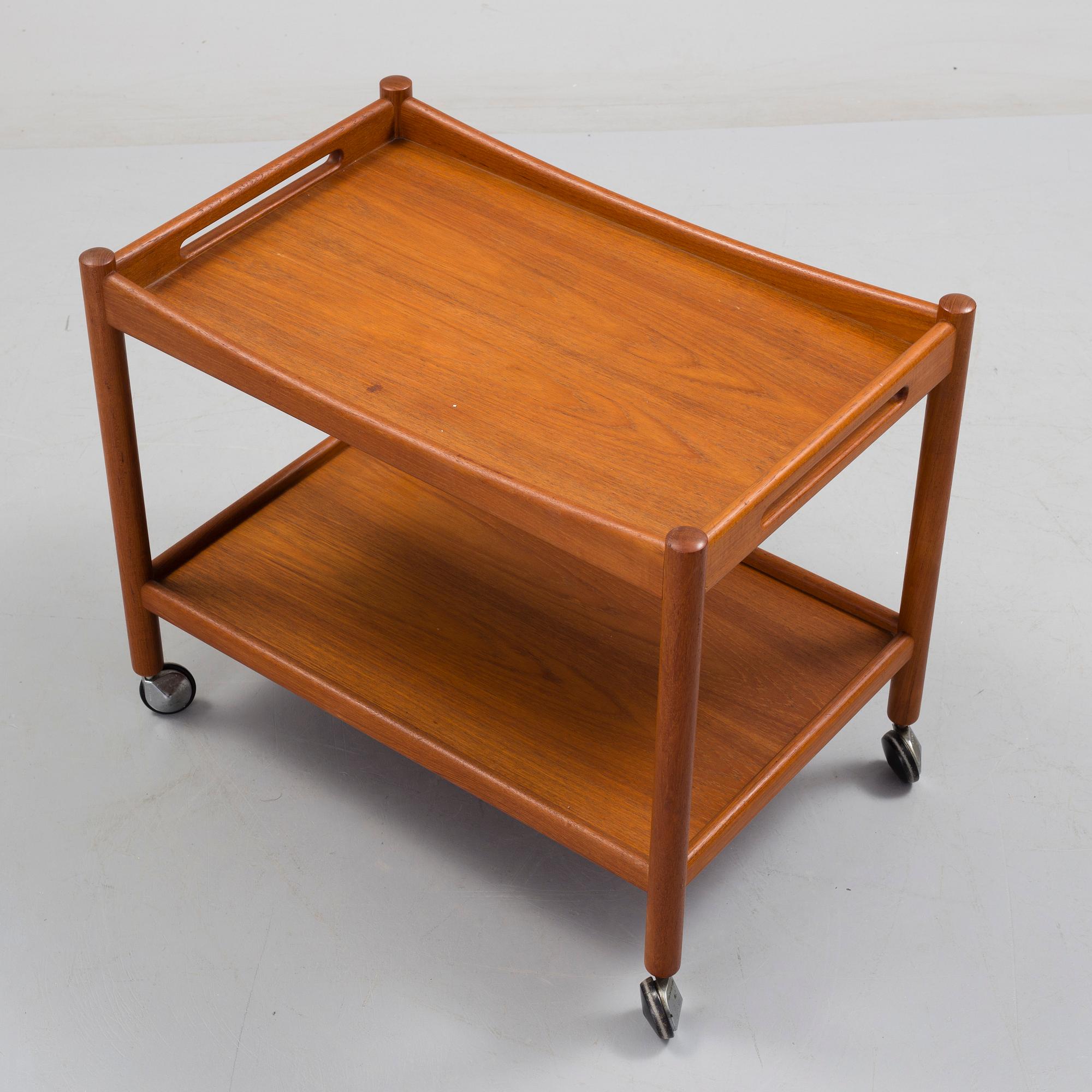 A Hans J Wegner serving trolley veneered with teak.