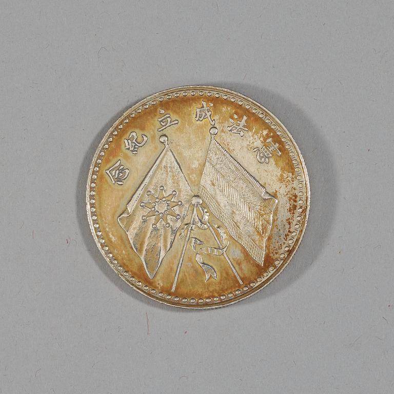A box with five silver coins, Republic, early 20th Century.