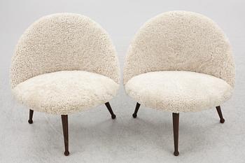 A pair of Scandinavian Modern lounge chairs, 1950's.