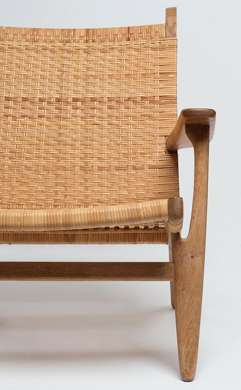 Hans J. Wegner, an oak "CH-27" easy chair, Carl Hansen & Son, Denmark, 1950-60's.