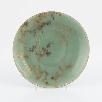 A Chinese celadon dish, late Qing dynasty/circa 1900.