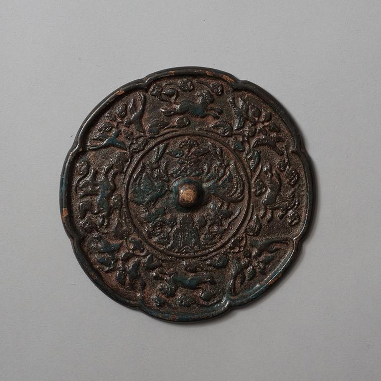 Two bronze mirrors, Six dynasties (220-589) and Tang dynasty (618-907).