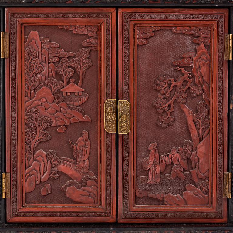 A lacquer display cabinet, late 19th Century.