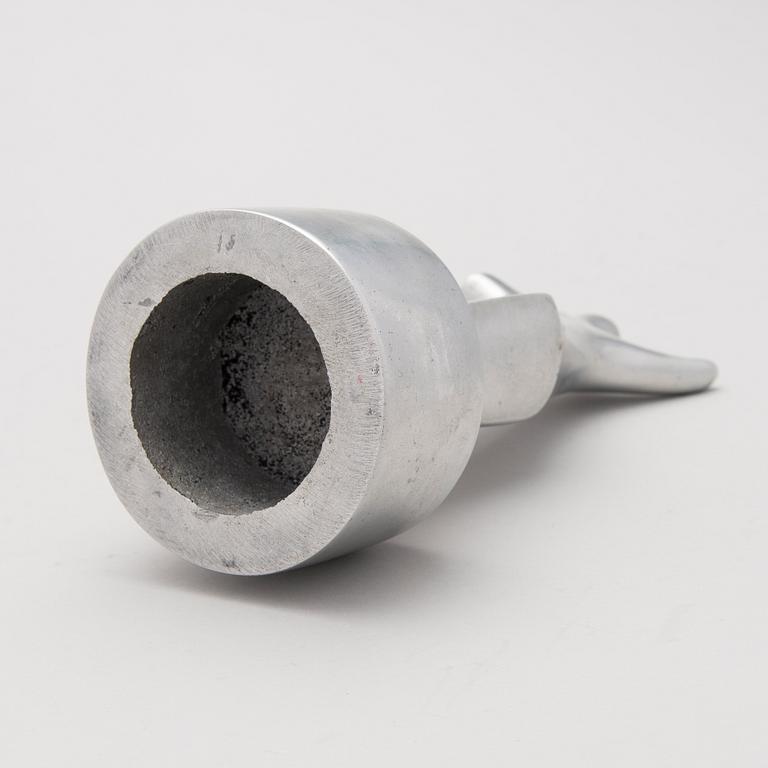 An aluminium sculpture, signed and numbered 5/7, dated -85.