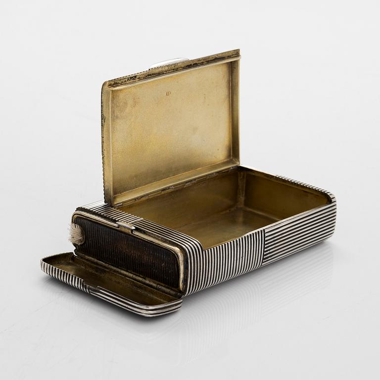 A silver cigarette case with match box and lighter, silver, St. Petersburg, 1882-1899. Unidentified master mark PS.