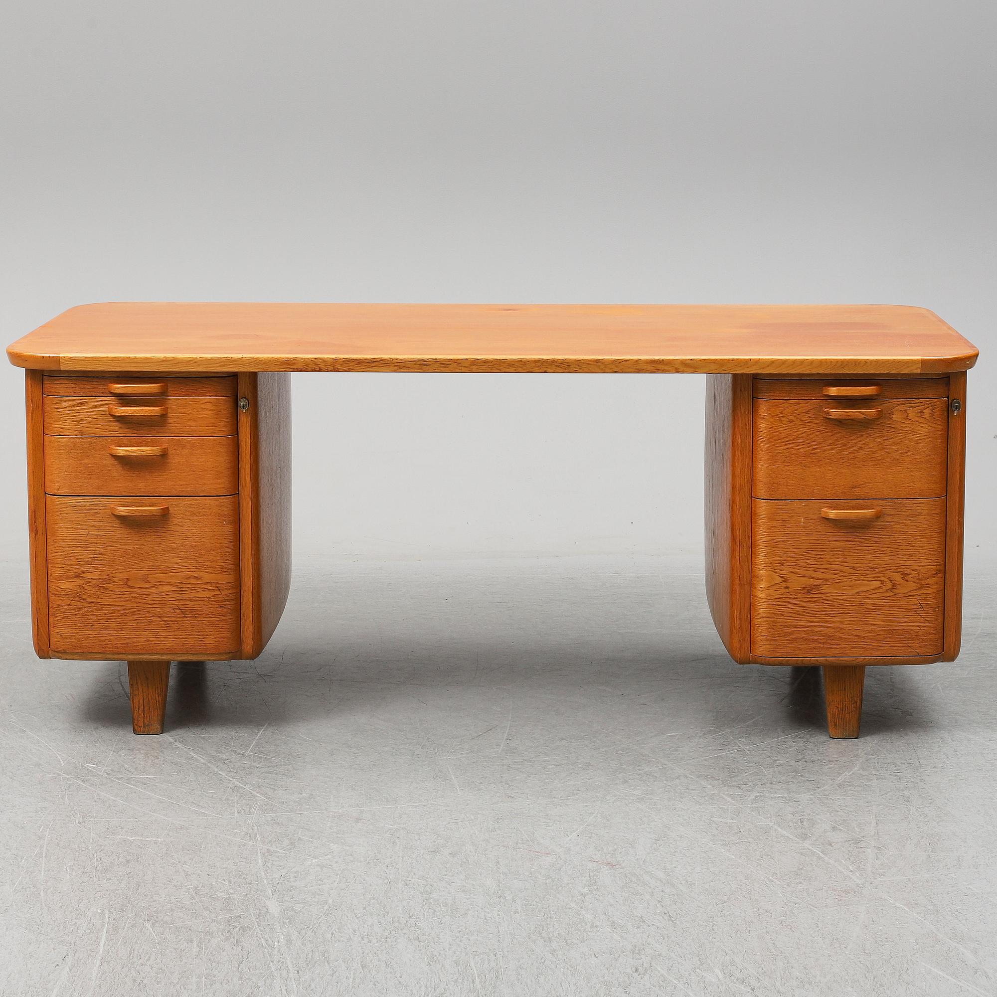 A 1950/60's oak writing desk.