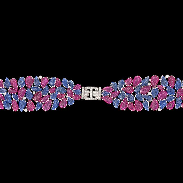 A carved ruby, blue sapphire and diamond bracelet.