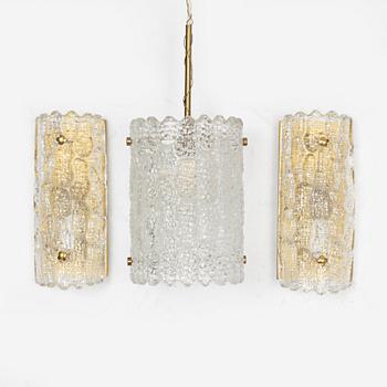 Carl Fagerlund, a pair of brass and glass wall lights and a ceiling light, Orrefors.