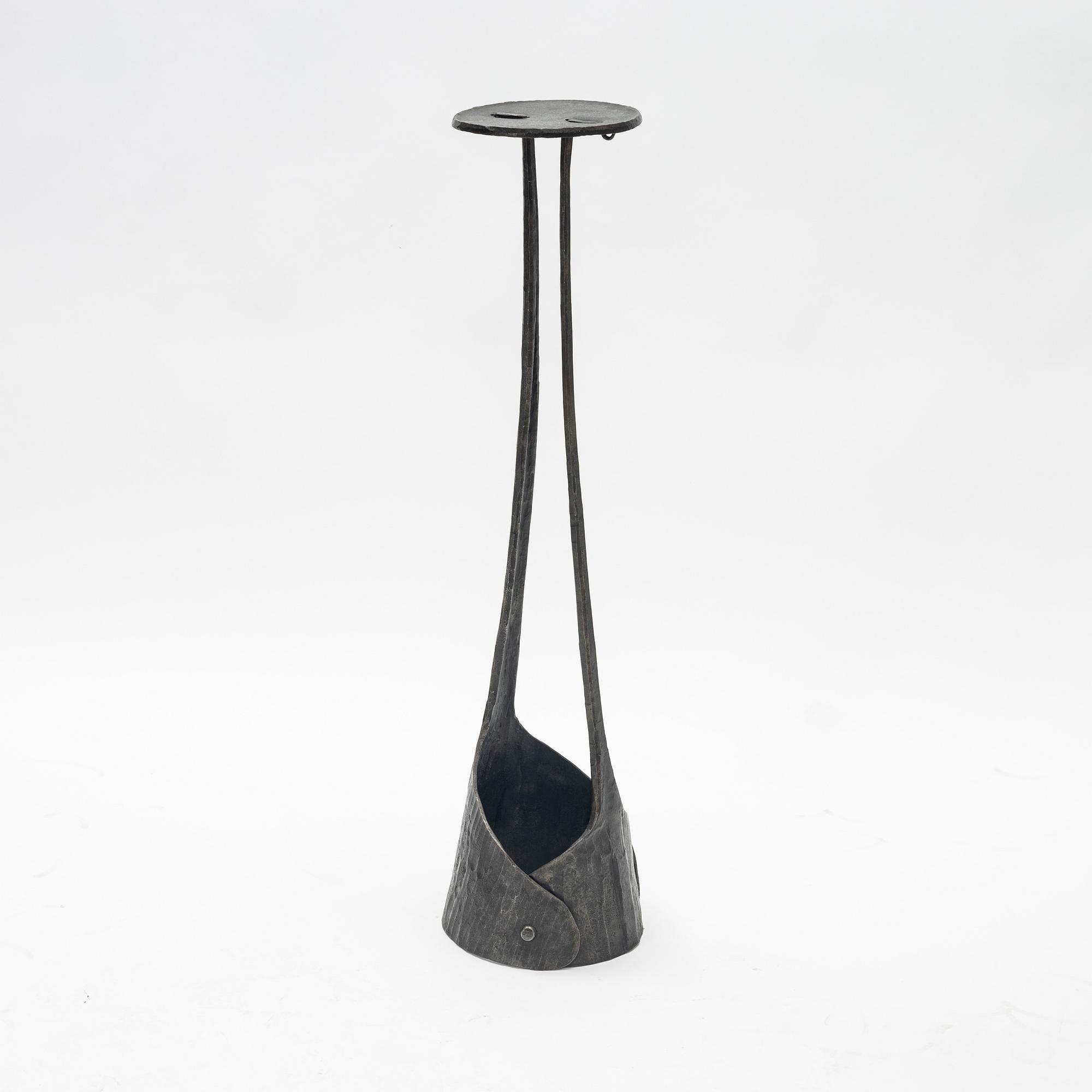 A cast iron pedestal, 20th century.