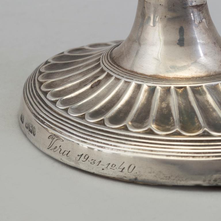 HARRISON BROTHERS & HOWSON, a pair of silver and mother of pearl candlesticks from Sheffield, England, 1926.