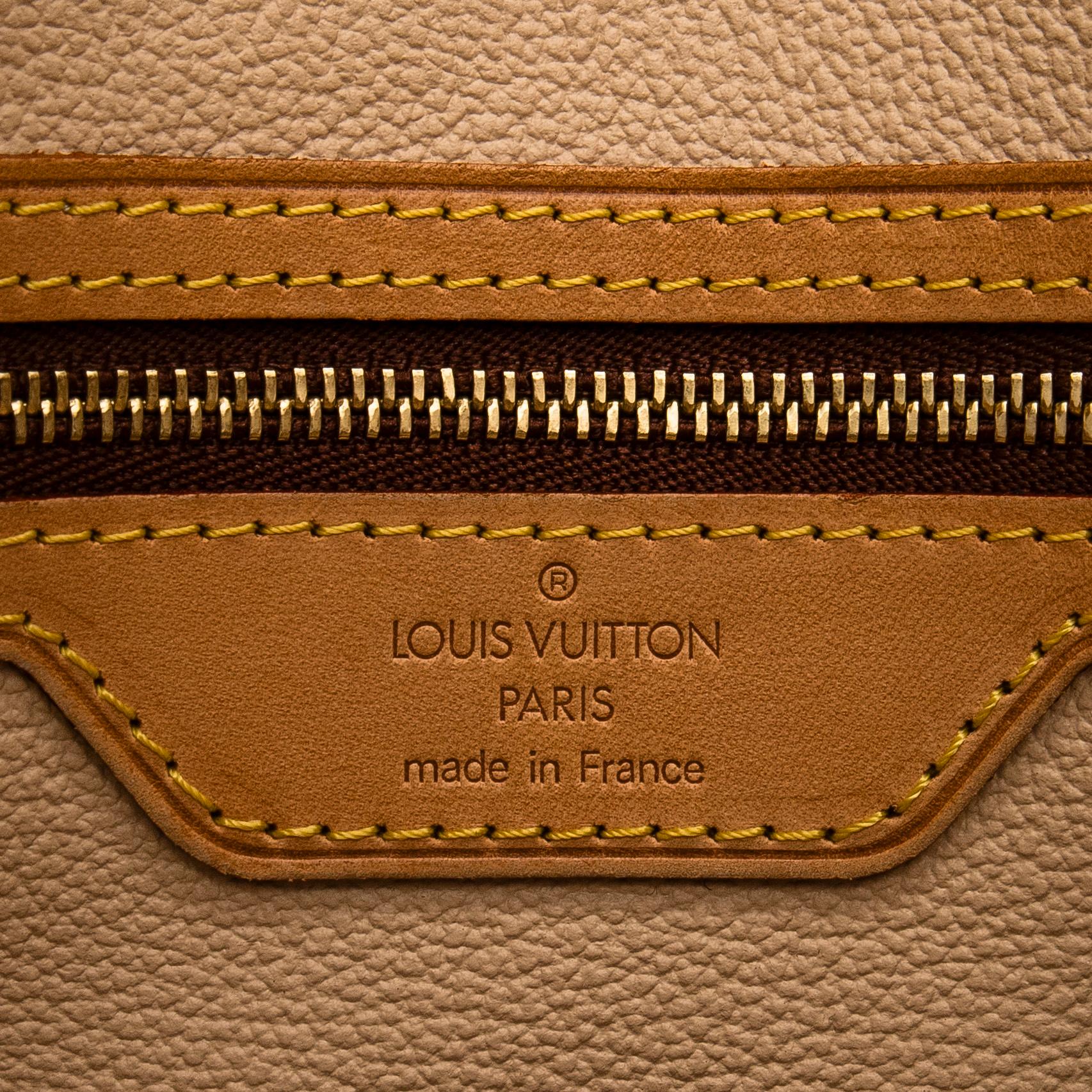 Louis Vuitton,  a Monogram Canvas 'Petit Bucket' bag with pochette.