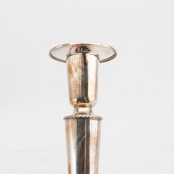 A Swedish 20th century pair of silver candle sticks mark of K&E Carlson Gohtenburg 1965.