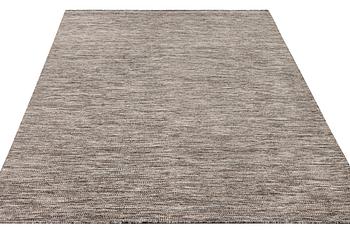 A flat weave carpet, c. 337 x 328 cm.