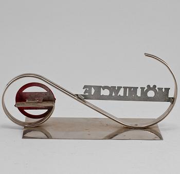 REKLAMSKYLT, metall, omkring 1900-talets mitt.