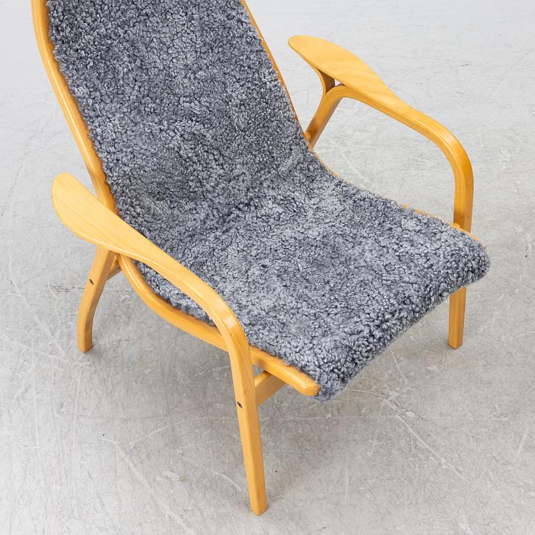 Yngve Ekström, armchair with footstool, 'Lamino', Swedese.