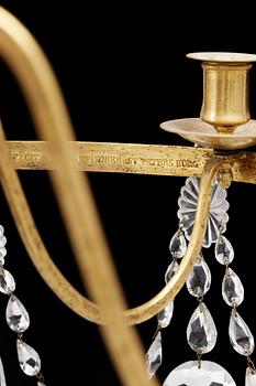 A six-light chandelier by Fischer, St Petersburg 1797. Signed "FECIT I A S FISCHER ST PETERSBURG 1797".