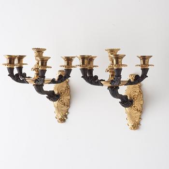 A pair of French circa 1830 five-light wall-lights.