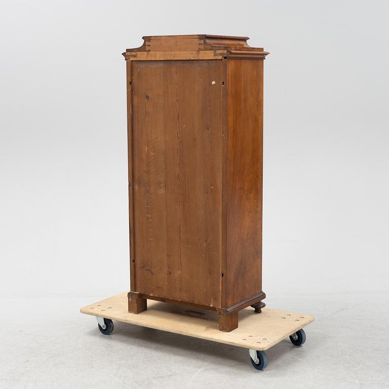A walnut veneered cabinet, second half of the 19th Century.