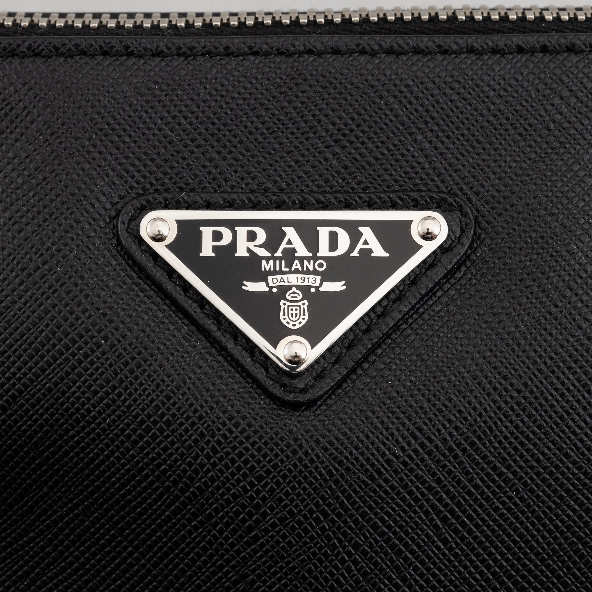 Prada, clutch.